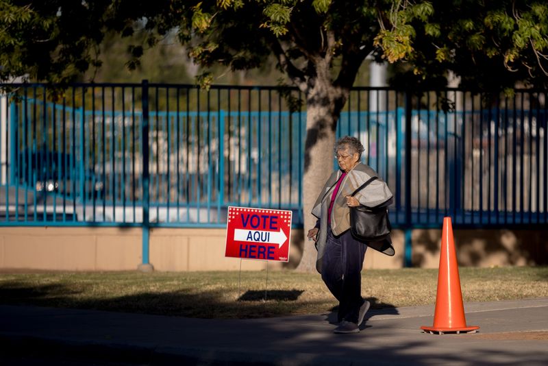 A lady walks out of the David Ortiz Rec Center in El Paso, Texas, after voting on Tuesday, Nov. 5, 2024.