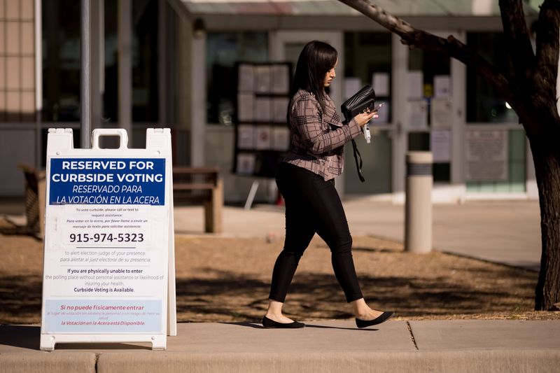 People walk to the Family Youth Services Center in El Paso, Texas, to vote on Tuesday, Nov. 5, 2024.