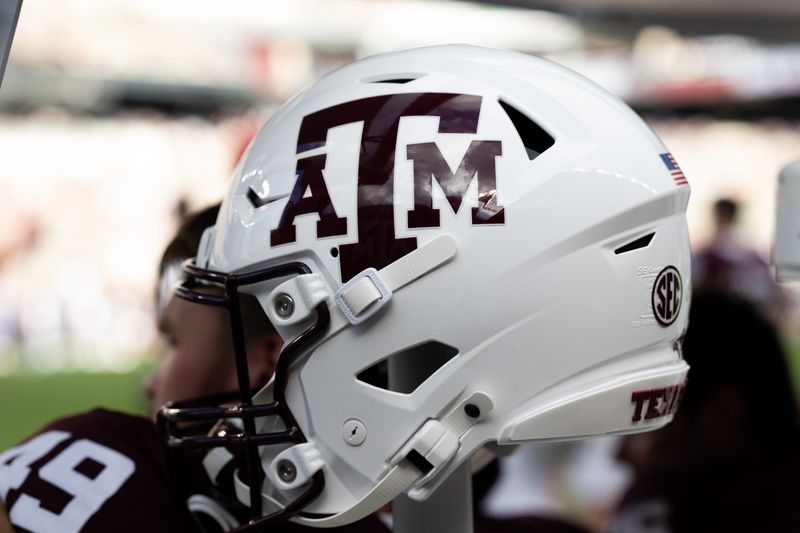 Aug 31, 2024; College Station, Texas, USA; A detailed view of a Texas A&M Aggies helmet on the sideline prior to the game against the Notre Dame Fighting Irish at Kyle Field. Mandatory Credit: Maria Lysaker-USA TODAY Sports
