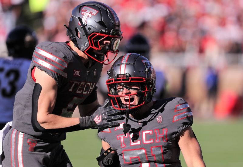 Texas Tech's Joseph Plunk, right, reacts after a tackle against Colorado in a Big 12 football game Saturday, Nov. 9, 2024, at Jones AT&T Stadium.
