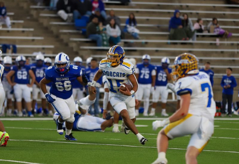 Sunray quarterback Armando Lujan (15) runs the ball against the Olton defense during a Class 2A Division I bi-district championship game Thursday Nov. 14, 2024 at Happy State Bank Stadium in Canyon, Texas.