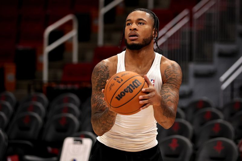 Nov 2, 2024; Houston, Texas, USA; Houston Rockets guard Cam Whitmore (7) warms up prior to the game against the Golden State Warriors at Toyota Center. Mandatory Credit: Erik Williams-Imagn Images