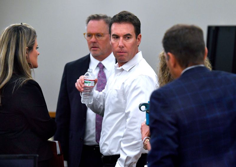 Anthony Patterson, center, is surrounded by his legal team during his trial on child sexual abuse in Fort Worth  in November 2024.