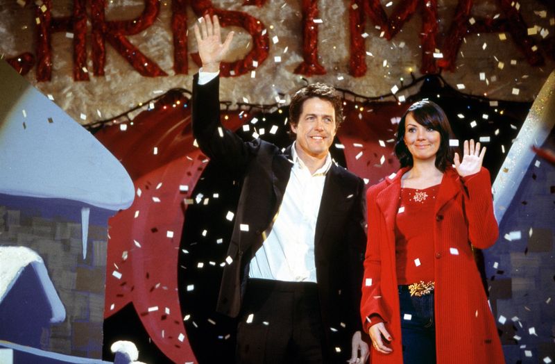 The prime minister (Hugh Grant) and his staffer, Natalie (Martine McCutcheon), are just one of the couples in the rom-com who prove "love actually is all around" in the 2003 Christmas film "Love Actually."