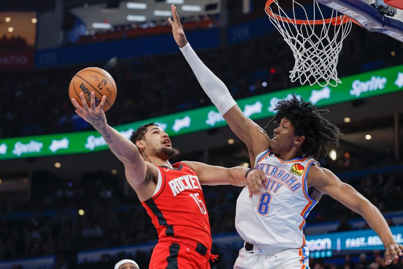 Feb 4, 2023; Oklahoma City, Oklahoma, USA; Houston Rockets guard Daishen Nix (15) goes to the basket against Oklahoma City Thunder forward Jalen Williams (8) during the first quarter at Paycom Center. Mandatory Credit: Alonzo Adams-USA TODAY Sports