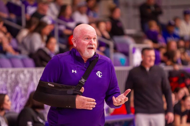 Irion County girls basketball coach Don Coffell talks with a referee during a game against Garden City at the Hornet Gymnasium in Mertzon on Friday, Jan. 17, 2025.