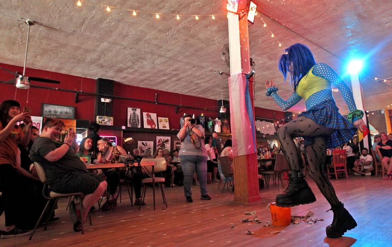 A performer dances for the audience during a drag show June 13, 2021, at The House of Fifi Dubois.