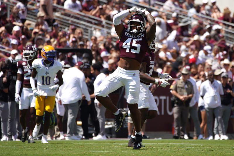 Sep 7, 2024; College Station, Texas, USA; Texas A&M Aggies linebacker Jordan Lockhart (45) reacts during the fourth quarter against the McNeese State Cowboys at Kyle Field. Mandatory Credit: Dustin Safranek-Imagn Images