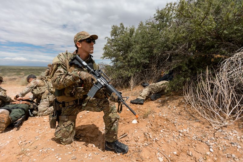 U.S. Border Patrol Search Trauma and Rescue (BORSTAR) candidates secure the scene during a field rescue training course in the McGregor Training Area of Fort Bliss in 2022.