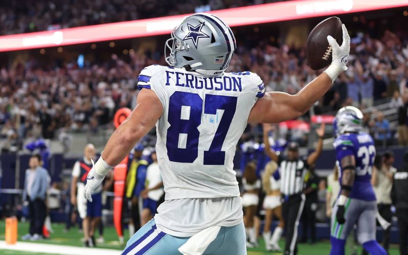 Nov 30, 2023; Arlington, Texas, USA; Dallas Cowboys tight end Jake Ferguson (87) celebrates after a touchdown catch during the second half against the Seattle Seahawks at AT&T Stadium. Mandatory Credit: Tim Heitman-USA TODAY Sports