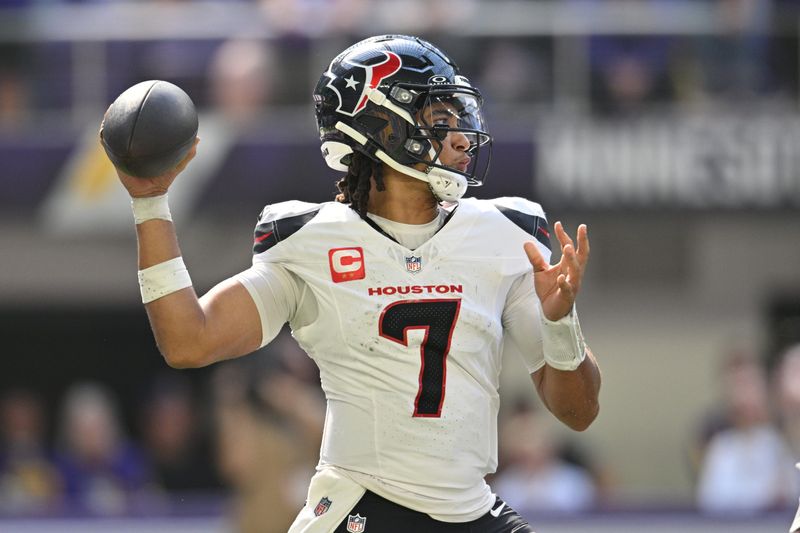 Sep 22, 2024; Minneapolis, Minnesota, USA; Houston Texans quarterback C.J. Stroud (7) throws a pass during the second quarter against the Minnesota Vikings at U.S. Bank Stadium. Mandatory Credit: Jeffrey Becker-Imagn Images