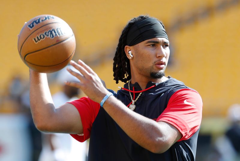 Aug 9, 2024; Pittsburgh, Pennsylvania, USA; Houston Texans quarterback C.J. Stroud (7) warms up with a basketball before a game against the Pittsburgh Steelers at Acrisure Stadium. Mandatory Credit: Charles LeClaire-USA TODAY Sports