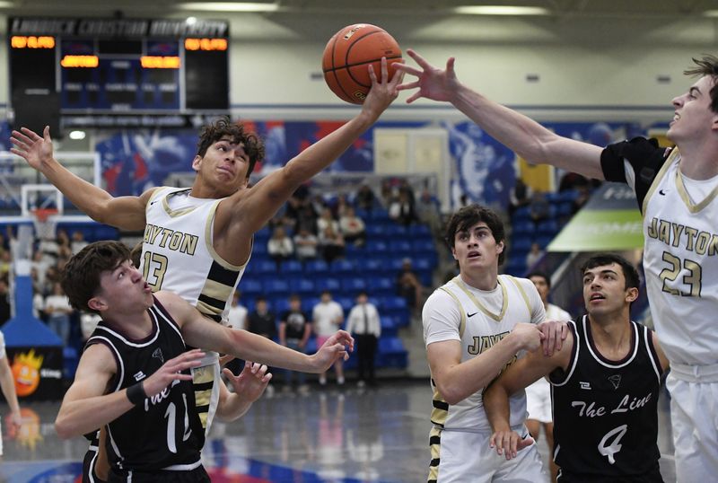 Jayton's Sean Stanaland grabs a rebound against Texline in a Class 1A Division II state semifinal boys basketball game Monday, March 3, 2025, at the Rip Griffin Center.