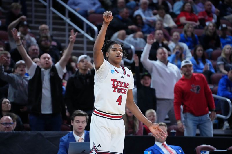 Mar 22, 2025; Wichita, KS, USA; Texas Tech Red Raiders guard Christian Anderson (4) reacts after a play against the Drake Bulldogs during the second half at Intrust Bank Arena. Mandatory Credit: Kirby Lee-Imagn Images
