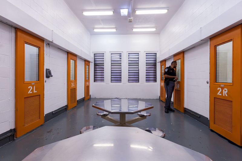 El Paso County Sheriff Oscar Ugarte checks on an inmate in a separation cell block on Tuesday, April 2, 2025, at the El Paso County Downtown Detention Facility. These cell blocks do not have cameras but are subject to regular checks and are designated for individuals who are or were gang members or those with mental health conditions.