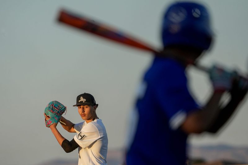 Horizon High School's Franklin Miller pitches to Americas High School during their game at Horizon on April 7, 2025. Americas won 7-0.