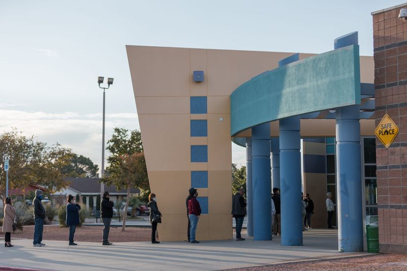 El Pasoans wait in line at the Marty Robbins Recreation Center voting polls on Election Day for the 2022 midterm election on Tuesday, Nov. 8, 2022.