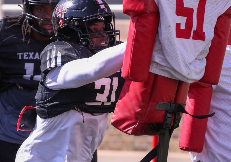Texas Tech's David Bailey goes through a drill during spring football practice, Tuesday, April 15, 2025, at Jones AT&T Stadium.