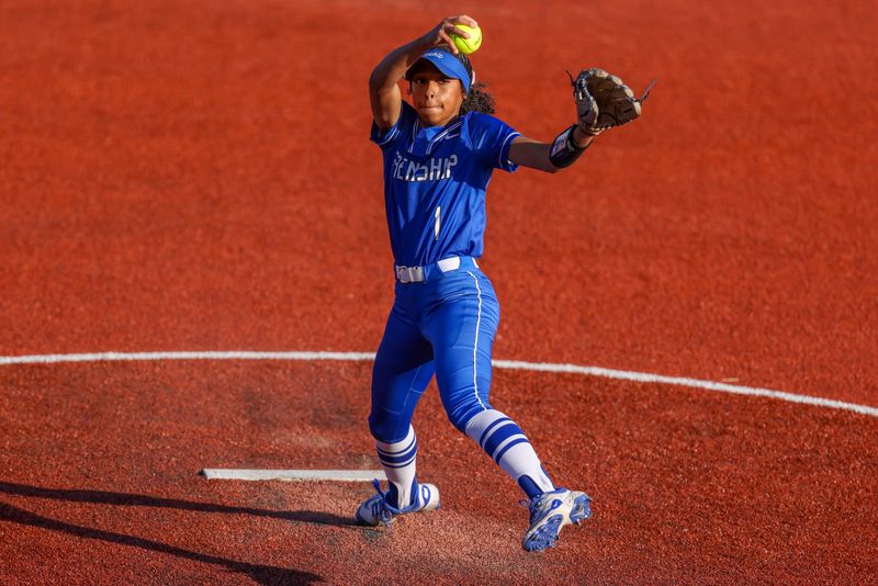 Frenship’s Lexi Clark pitches the ball during a District 2-6A softball game against Midland on Tuesday, April 15, 2025, at Frenship High School in Wolfforth.