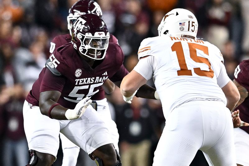 Nov 30, 2024; College Station, Texas, USA; Texas A&M Aggies offensive lineman Ar'maj Reed-Adams (55) blocks against Texas Longhorns defensive lineman Bill Norton (15) during the first quarter. The Longhorns defeated the Aggies 17-7 at Kyle Field. Mandatory Credit: Maria Lysaker-Imagn Images