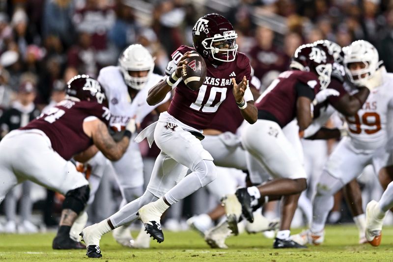 Nov 30, 2024; College Station, Texas, USA; Texas A&M Aggies quarterback Marcel Reed (10) runs the ball during the first half against the Texas Longhorns. The Longhorns defeated the Aggies 17-7 at Kyle Field. Mandatory Credit: Maria Lysaker-Imagn Images