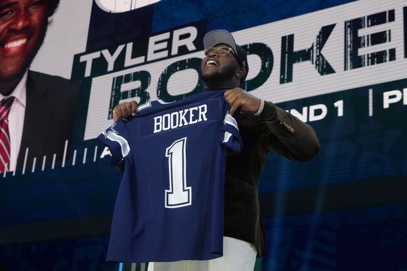 Apr 24, 2025; Green Bay, WI, USA; Alabama Crimson Tide offensive lineman Tyler Booker is selected by the Dallas Cowboys as the number twelve pick in the first round of the 2025 NFL Draft at Lambeau Field. Mandatory Credit: Kirby Lee-Imagn Images