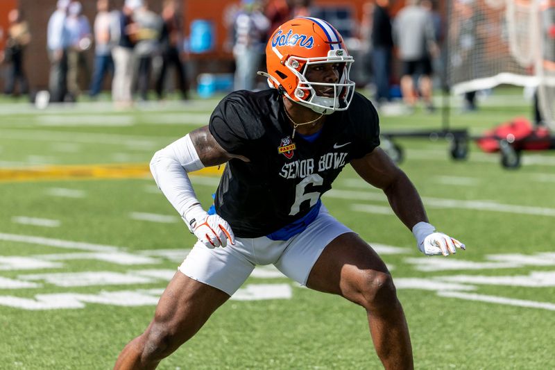 Jan 29, 2025; Mobile, AL, USA; American team linebacker Shemar James of Florida (6) works in drills during Senior Bowl practice for the National team at Hancock Whitney Stadium. Mandatory Credit: Vasha Hunt-Imagn Images