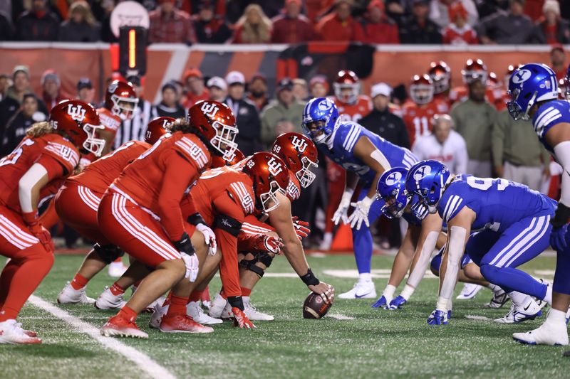 Nov 9, 2024; Salt Lake City, Utah, USA; The Utah Utes offense lines up against the Brigham Young Cougars defense during the first quarter at Rice-Eccles Stadium. Mandatory Credit: Rob Gray-Imagn Images
