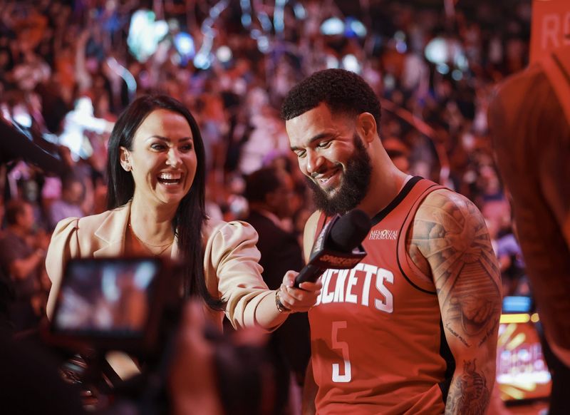 Dec 1, 2024; Houston, Texas, USA; Houston Rockets guard Fred VanVleet (5) is interviewed after the game against the Oklahoma City Thunder at Toyota Center. Mandatory Credit: Troy Taormina-Imagn Images