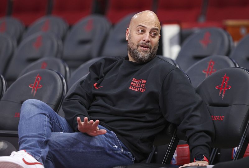 Nov 24, 2023; Houston, Texas, USA; Houston Rockets general manager Rafael Stone talks before the game against the Denver Nuggets at Toyota Center. Mandatory Credit: Troy Taormina-USA TODAY Sports