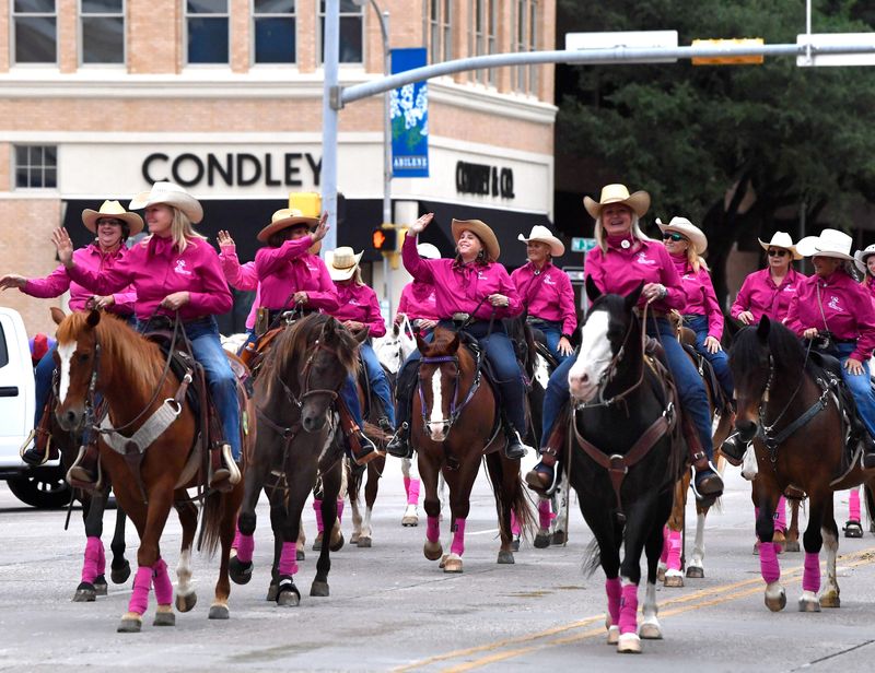 Members of the 40-Something Cowgirls ride down Pine St. during Thursday’s Western Heritage Classic parade in Abilene May 8, 2025.