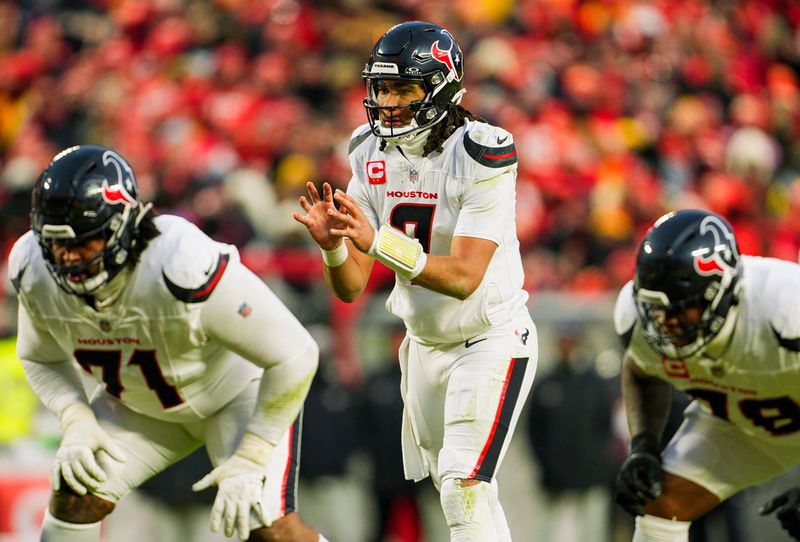 Jan 18, 2025; Kansas City, Missouri, USA; Houston Texans quarterback C.J. Stroud (7) gets ready before the snap during the second half against the Kansas City Chiefs in a 2025 AFC divisional round game at GEHA Field at Arrowhead Stadium. Mandatory Credit: Jay Biggerstaff-Imagn Images