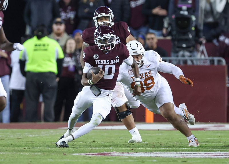 Nov 30, 2024; College Station, Texas, USA; Texas A&M Aggies quarterback Marcel Reed (10) runs with the ball during the fourth quarter against the Texas Longhorns at Kyle Field. Mandatory Credit: Troy Taormina-Imagn Images