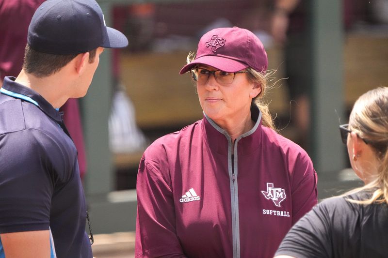 Texas A&M head coach Trisha Ford talks to officials ahead of the NCAA D1 Softball Tournament Regional against Saint Francis University at Davis Diamond at Texas A&M University on Friday, May 16, 2025 in College Station, Texas.