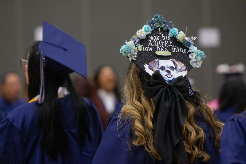 Cesilia Cardenas, a nursing graduate, waits in line to check in at Del Mar College's spring commencement in Corpus Christi on May 16, 2025.
