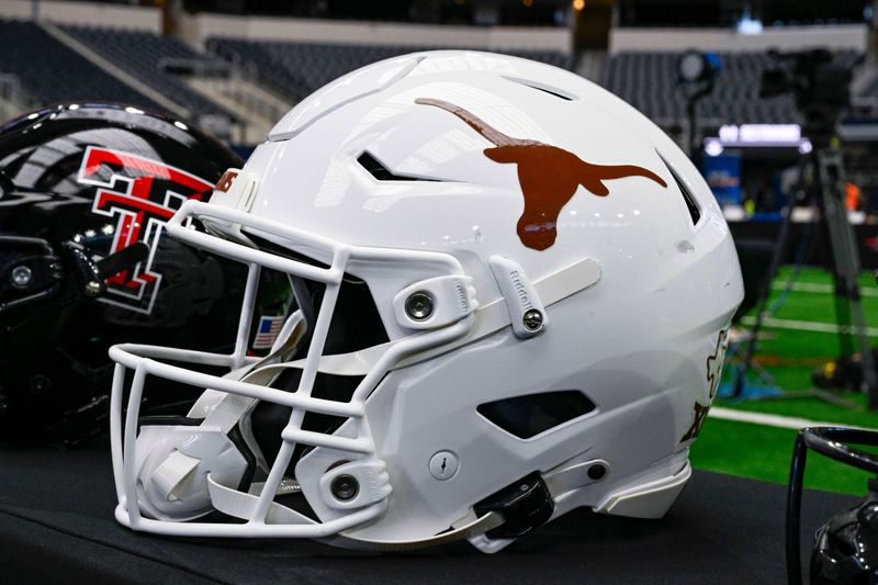 Texas Longhorns helmet and logo during Big 12 football media day at AT&T Stadium. Mandatory Credit: Jerome Miron-USA TODAY Sports