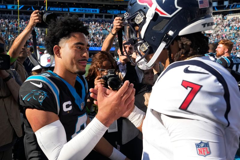 Oct 29, 2023; Charlotte, North Carolina, USA; Carolina Panthers quarterback Bryce Young (9) and Houston Texans quarterback C.J. Stroud (7) after the game at Bank of America Stadium. Mandatory Credit: Bob Donnan-USA TODAY Sports