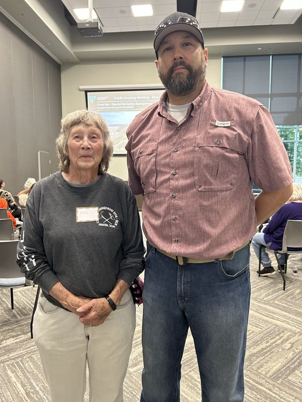 Mary Herring, a volunteer with Friends of Cross Bar SRMA, stands next to Adrian Escobar, a planner for the new area, during a recent scoping meeting held for the public by the Bureau of Land Management to seek input on the recreational space north of Amarillo.