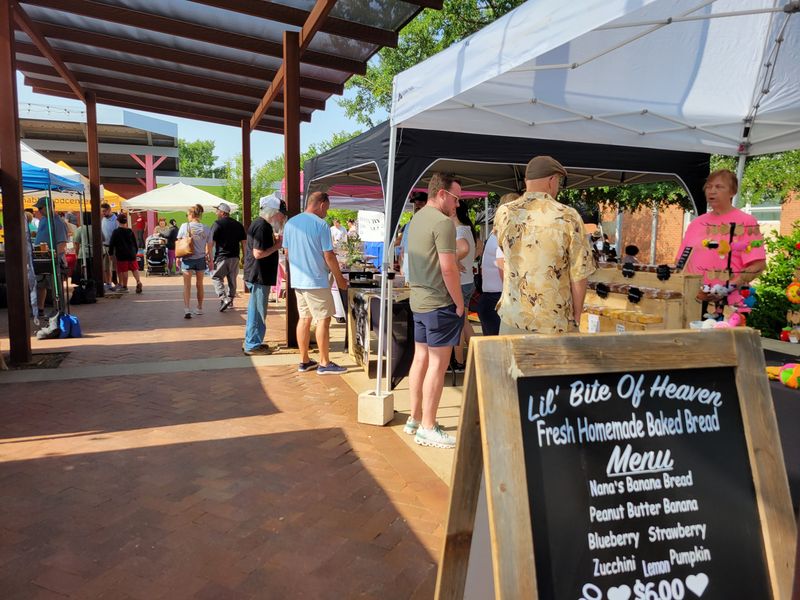 Shoppers peruse the vendors at LHUCA Plaza, 511 Ave. K, as seen on Saturday, May 31, 2025.