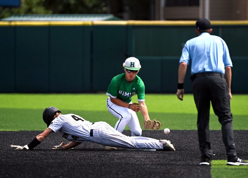 Gordon’s Aiden Shank slides across the bag as the ball bounces from the glove of Hamlin second baseman Zane Leonard during their Class 1A state semifinal baseball game in Abilene Saturday May 31, 2025. Final score was 9-6, Gordon.