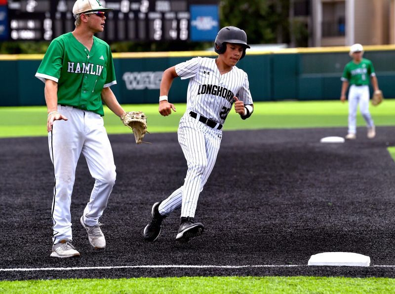 Gordon baserunner Jaedon Dixon approaches the bag as Hamlin third baseman Hagan Holkind warns the catcher during the Class 1A state semifinal baseball game in Abilene Saturday May 31, 2025. Final score was 9-6, Gordon.