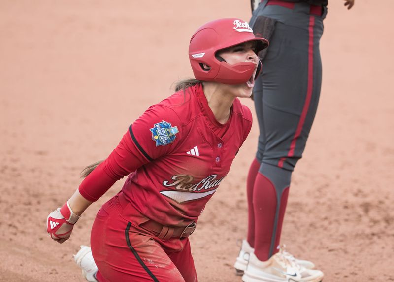Jun 2, 2025; Oklahoma City, OK, USA; Texas Tech Red Raiders outfielder Demi Elder (2) yells after hitting a triple and driving in a run in the second inning against the Oklahoma Sooners during the NCAA Softball Women's College World Series semifinal game at Devon Park. Mandatory Credit: Brett Rojo-Imagn Images