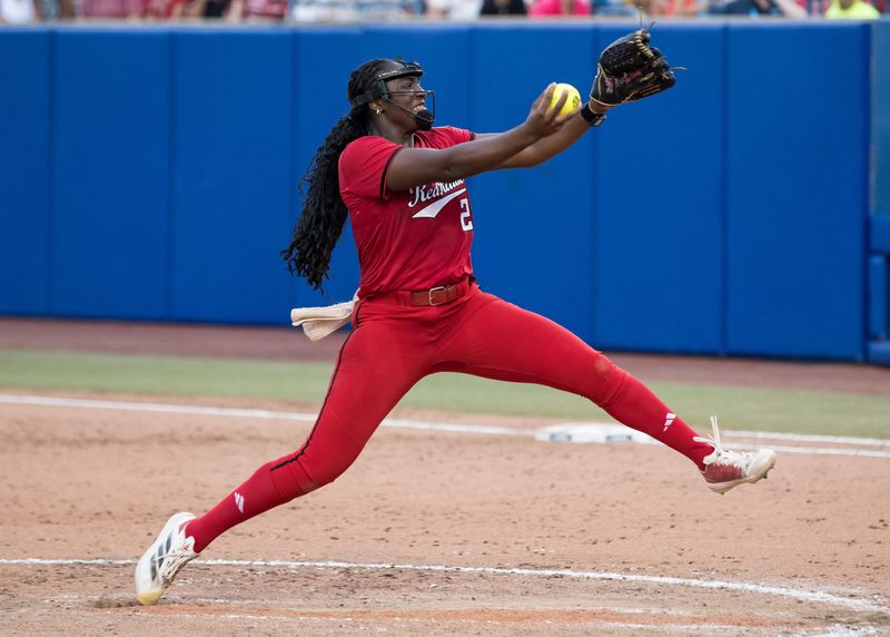 Jun 2, 2025; Oklahoma City, OK, USA; Texas Tech Red Raiders pitcher NiJaree Canady (24) throws a pitch in the seventh inning against the Oklahoma Sooners during the NCAA Softball Women's College World Series semifinal game at Devon Park. Mandatory Credit: Brett Rojo-Imagn Images