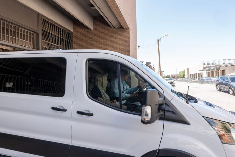 A van with detained migrants leaves the Richard C. White Federal Court building in El Paso, Texas on June 5, 2025.