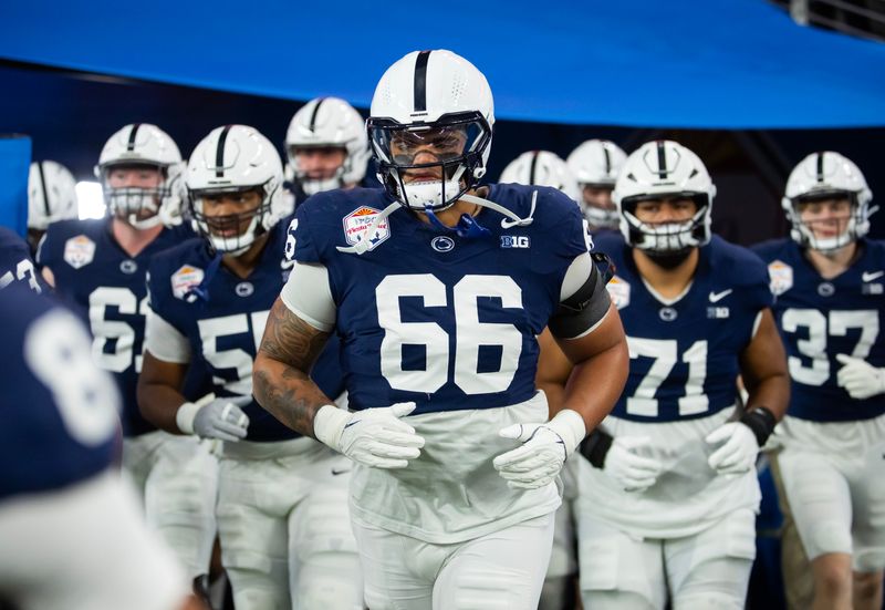 Dec 31, 2024; Glendale, AZ, USA; Penn State Nittany Lions offensive lineman Drew Shelton (66) against the Boise State Broncos during the Fiesta Bowl at State Farm Stadium. Mandatory Credit: Mark J. Rebilas-Imagn Images