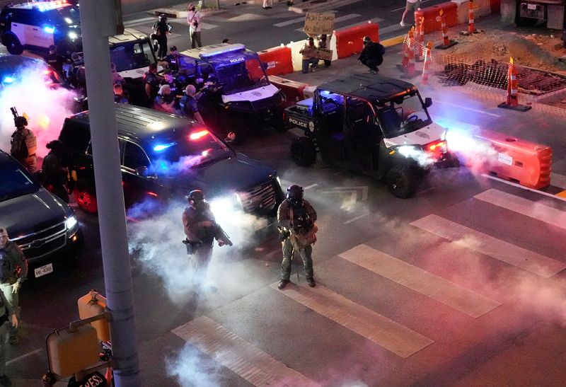 State troopers use chemical irritants to try to disperse a crowd of protesters near the J.J. Pickle Federal Building at a protest in Austin to express opposition to federal immigration raids and show solidarity with demonstrators in Los Angeles Monday, June 9, 2025.