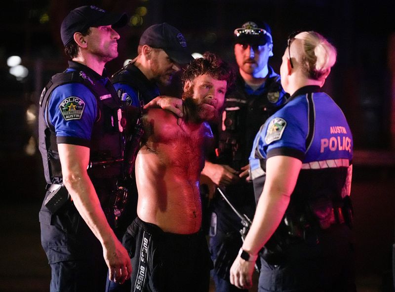 Austin police arrest a protester on Congress Avenue during a protest in Austin to express opposition to federal immigration raids and show solidarity with demonstrators in Los Angeles Monday, June 9, 2025.