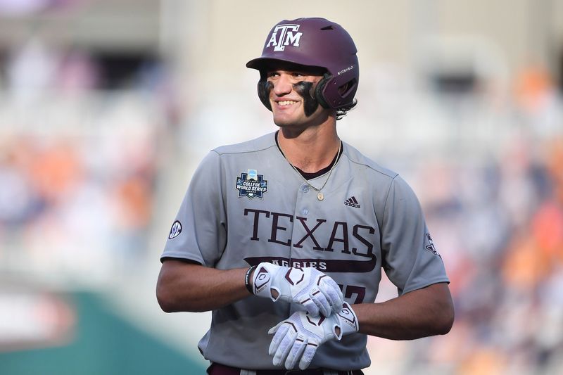 Texas A&M's Jace LaViolette (17) smiles during game three of the NCAA College World Series finals between Tennessee and Texas A&M at Charles Schwab Field in Omaha, Neb., on Monday, June 24, 2024.