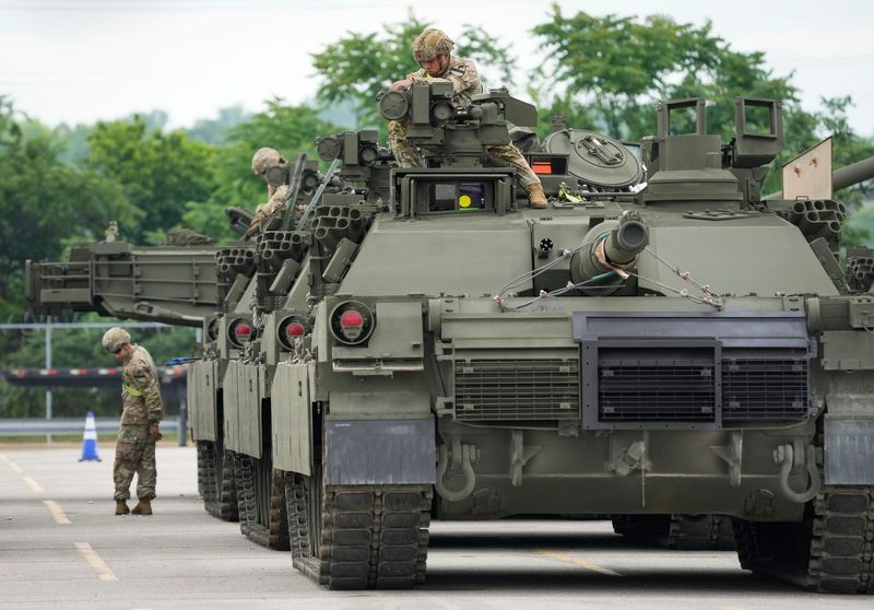 Three former U.S. Army soldiers from Fort Hood were sentenced after pleading guilty in a migrant smuggling case in Presidio, Texas.  In this photo, soldiers from Fort Hood offload M1A2 Abrams Main Battle Tanks and other vehicles for the parade marking the 250th anniversary of the U.S. Army  in Jessup, Md., on June 9, 2025.