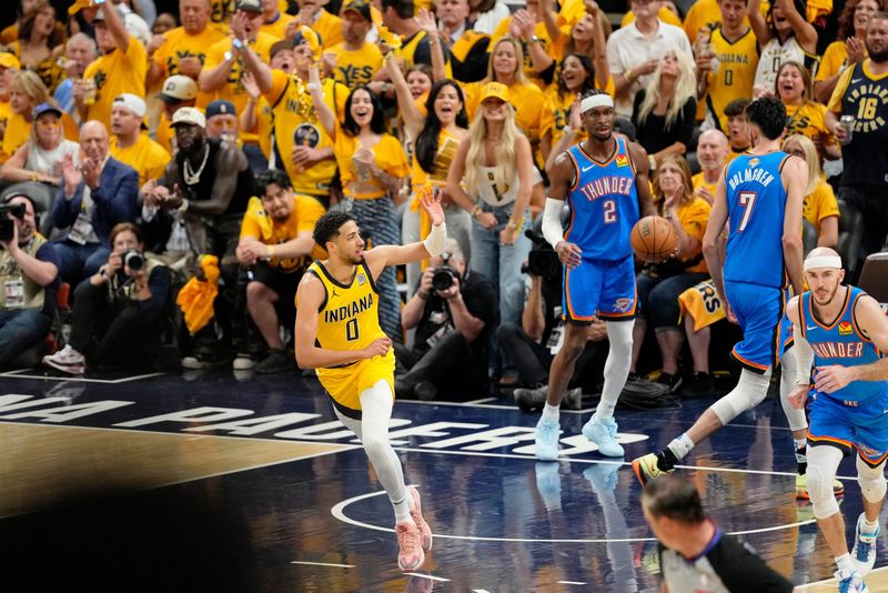 Jun 19, 2025; Indianapolis, Indiana, USA; Indiana Pacers guard Tyrese Haliburton (0) reacts after a play against the Oklahoma City Thunder during the first half of game six of the 2025 NBA Finals between the Oklahoma City Thunder and the Indiana Pacers at Gainbridge Fieldhouse.